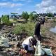 Peringati WCD 2021, Puluhan Relawan Geruduk Pantai Citra Lestari, Bersihkan Pantai dari Sampah