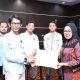 Suriadi Said (kiri) kembali terpilih secara aklamasi sebagai Ketua Persatuan Wartawan Indonesia (PWI) Bontang masa bakti 2023-2026. (ist)