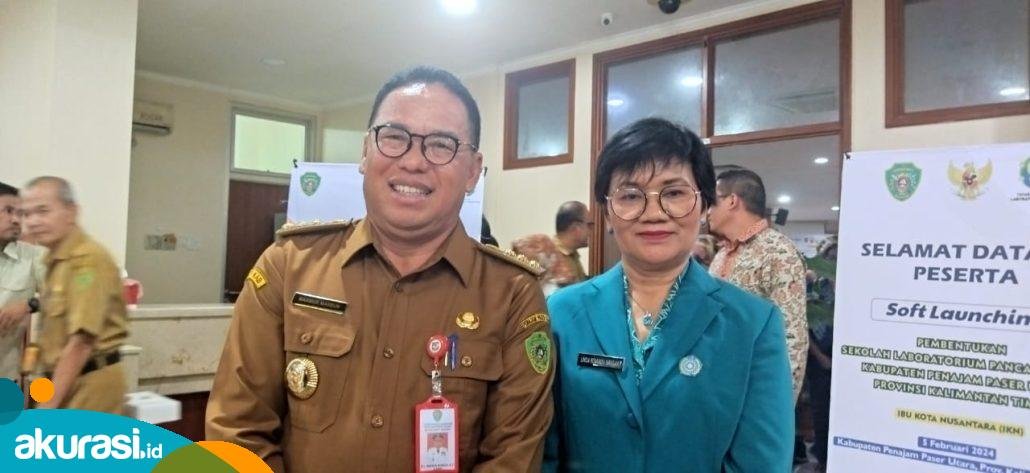 Bupati Penajam Paser Utara (PPU) Makmur Marbun dan Ketua TP PKK Linda Romauli Siregar. (Muhammad Zulkifli/Akurasi.id).