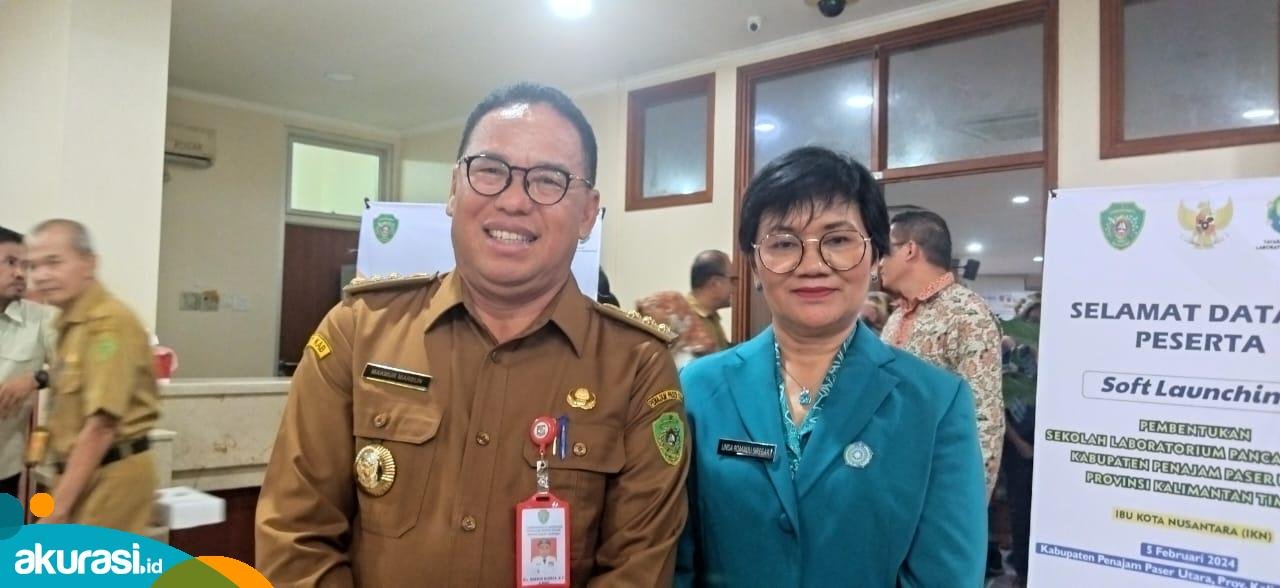 Bupati Penajam Paser Utara (PPU) Makmur Marbun dan Ketua TP PKK Linda Romauli Siregar. (Muhammad Zulkifli/Akurasi.id).
