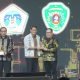 Pj Bupati PPU Terima Penghargaan Peduli Inovasi Ekonomi Kreatif dan Pariwisata dari Kompas Group